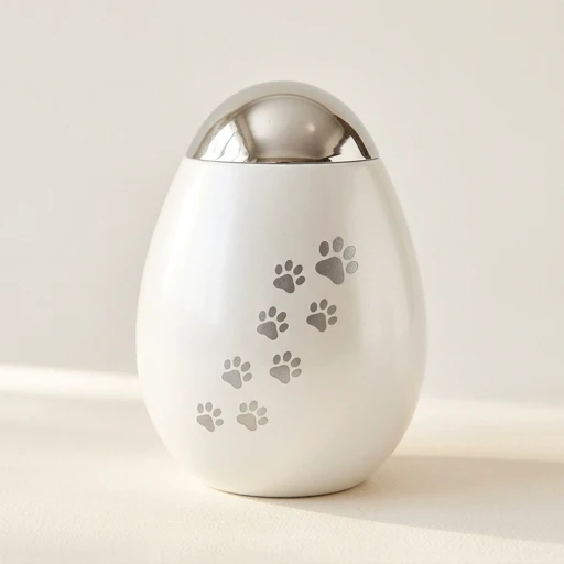RI00141 — Teardrop White Paw-Print Aluminum Pet Urn
